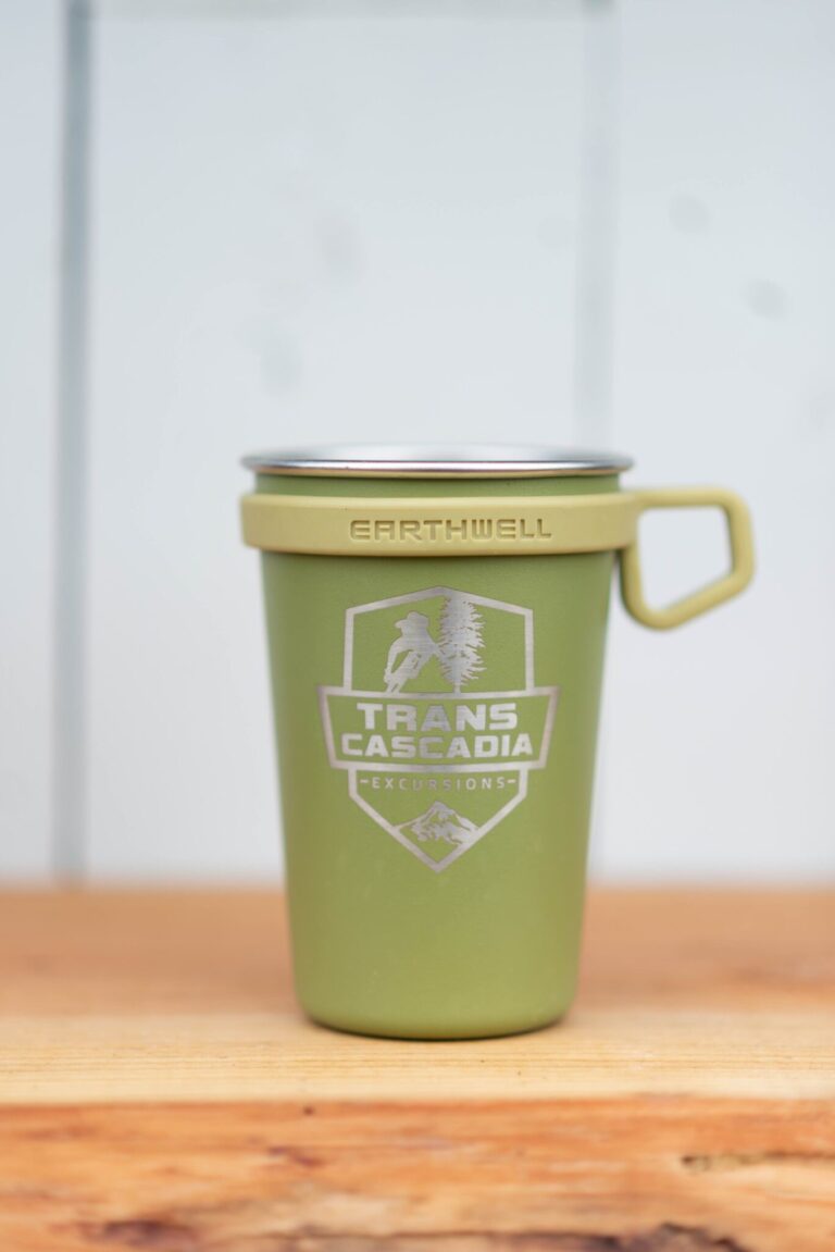 Earthwell pint cups showcasing blue, black, and green color options.
